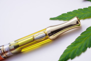 Fototapeta premium THC/CBD Cannabis Oil Vape Closeup Marijuana Leaf