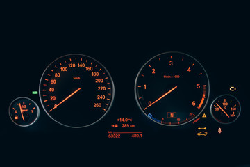 Modern car or automobile dashboard panel. Car HUD Speedometer instrument panel. Illuminated panel speed display car interior.
