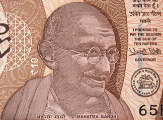 Mahatma Gandhi on India 10 new rupee (2018) note. Indian money currency bill close up.