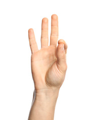 Man showing number nine on white background, closeup. Sign language