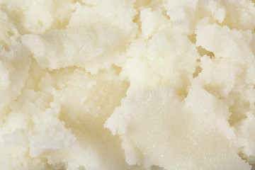 Fresh shea butter as background, top view. Cosmetic product