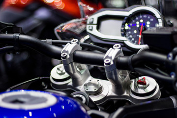 Speedometer and chrome parts on motorcycle handlebar
