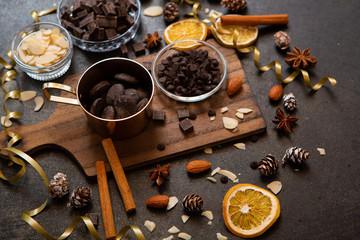 chocolates, ingredients on black table  
