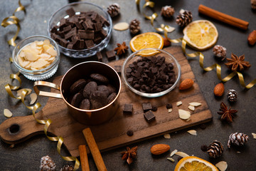 chocolates, ingredients on black table  
