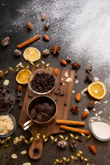 Fototapeta na wymiar chocolates, ingredients on black table 