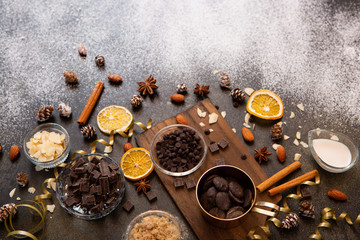 chocolates, ingredients on black table  