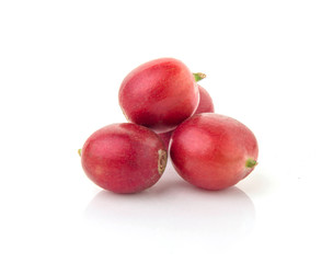 fresh coffee beans with leaf on white background