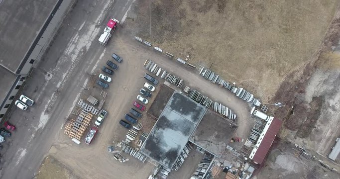 Firetruck Driving By Construction Company Aerial Drone Shot 4K