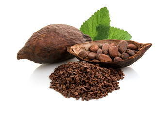 Cocoa pods and cocoa beans and cacao powder with leaves isolated on white background