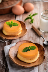 homemade caramel custard pudding with mint