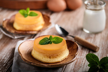 homemade caramel custard pudding with mint