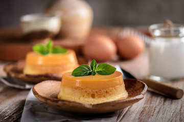 homemade caramel custard pudding with mint