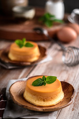 homemade caramel custard pudding with mint