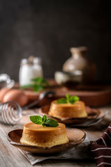 homemade caramel custard pudding with mint