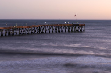 Ventura, California Pier and C Street beach at evening sunset and dusk