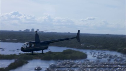 Aerial view helicopter with pilot flying USA