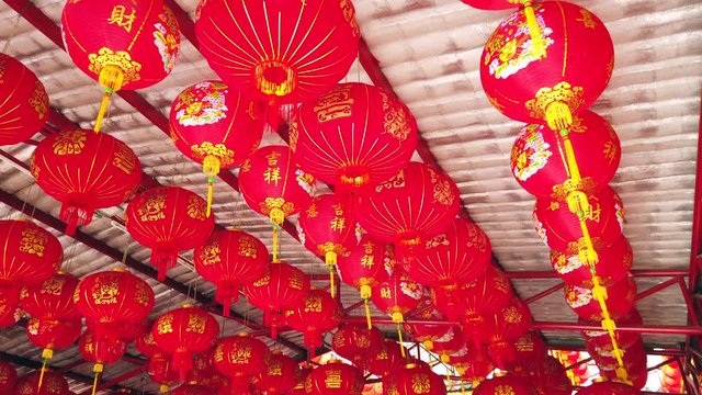 Red Chinese lantern hanging in joss house or Chinese temple, for celebrate Chinese New Year festival, 4k ultra HD slow motion.