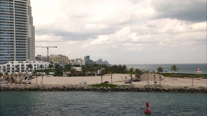 Aerial view people relaxing on South Beach Miami 