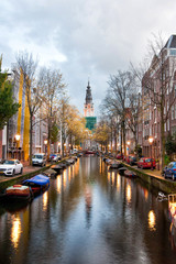 Amsterdam with Zuiderkerk church  'South Church' view from the Groenburgwal canal.