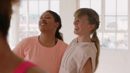 dance class best friends hugging celebrating successful practice workout having fun together in fitness studio - Powered by Adobe