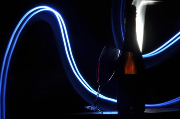 Champagne on New Year's Eve. Fajerwerek flares. New Year's greetings. Happiness and fun.