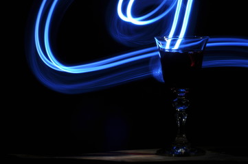 Champagne on New Year's Eve. Fajerwerek flares. New Year's greetings. Happiness and fun.