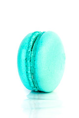 Sweet colorful macarons isolated on white background.