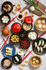 Flat lay Chinese new year food and drink on marble table top.