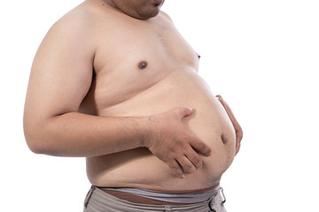 portrait of fat young man pinch excess fat that has around his waist