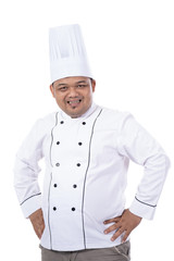 portrait of young male chef standing confident pose look at a front of the camera