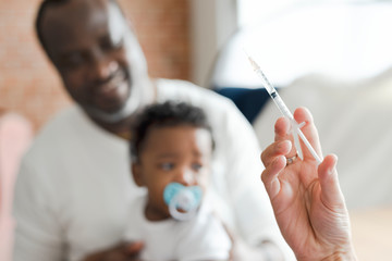 Baby getting a first injection