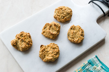 Homemade Salty Yogurt Cookies with Rolled Oats / Salted Pastries on Marble Board.