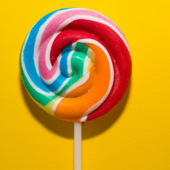 Lollipop with yellow background