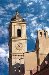 Fototapeta premium Old bell tower. The church of St. Giacomo and St. Filippo. City of Taggia, Italy