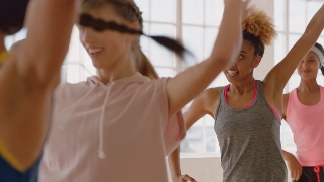 dance class happy group of multi ethnic people dancing enjoying training workout practicing choreography moves in fitness studio