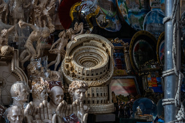 Fototapeta premium Souvenirs and magnets with Colosseum in Rome