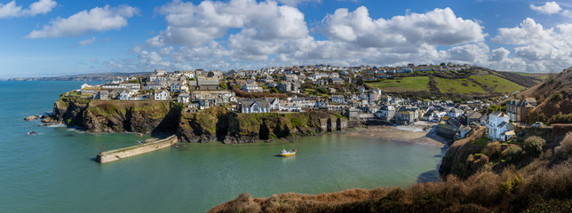 Panoramic view of the pretty fishing harbour of Port Issac in Cornwall, UK