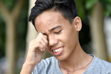 Fototapeta premium A Tearful Teenage Male