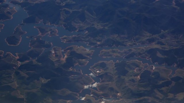 Aerial view of Paraibuna freshwater reservoir in Sao Paulo state feeding from the Paraitinga River and tributaries Paraibuna dam, part of the Cantareira water system that provides greater Sao Paulo an
