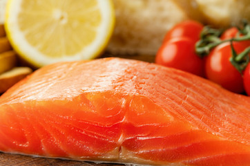 close-up view of salmon fillet with vegetables