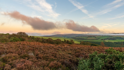 Evening dust over the landscape in the Exmoor National Park on Porlock Hill, Somerset, England, UK