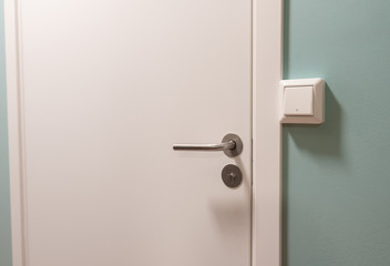 Interior modern hotel wood door and light switch