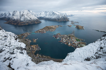 Landscape top view of Raine village and mountain islands from the peak of reinebringen