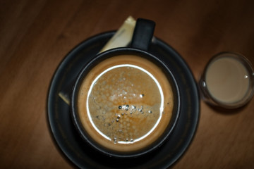 Espresso and a shot of liquor The popular coffee and alcoholic drink is latte or americano with the  