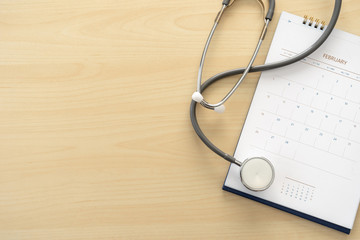 Medical appointment book in the calendar  stethoscope and calendar schedule to check up