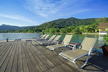 Outdoor beach chair with island background.