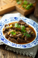 Beef goulash with pickled cucumber