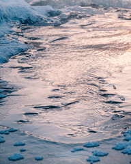 Icy winter sunset river