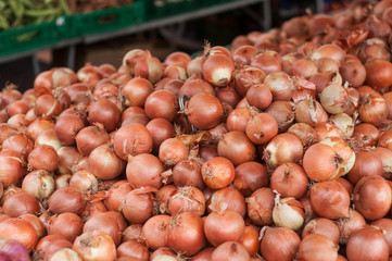 closeup of onions stack at the market