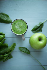 fresh greens and juicy green apple for juice